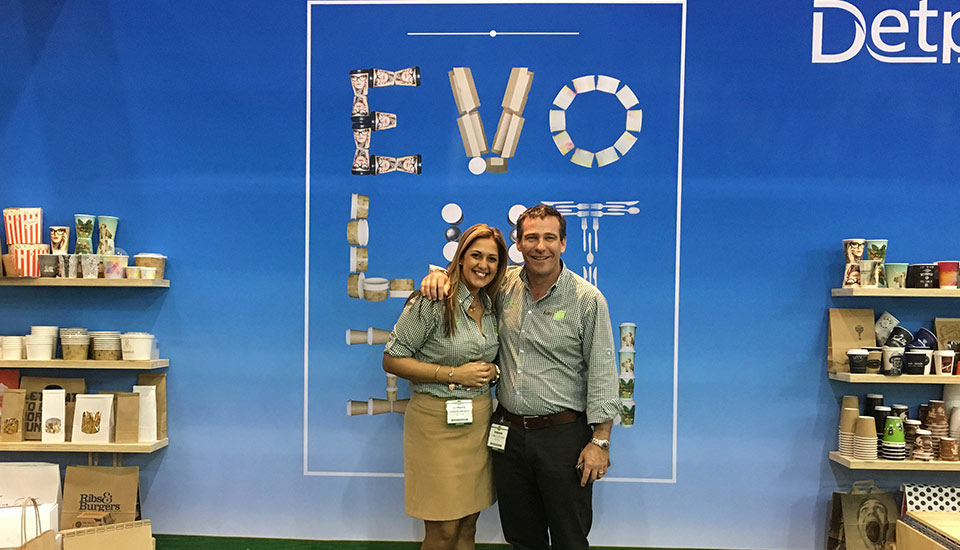 Candice Orlando and Tom Clifford at a Tradeshow
