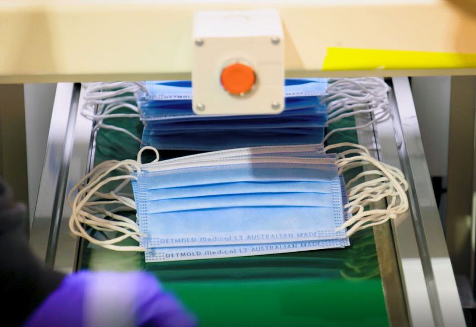 Image of a stack of masks on a line